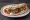 Bifteki Kotopoulo: an illustration of the sandwich.
