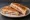 Bikini de Pernil i Formatge: an illustration of ham and cheese.