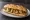 Bocadillo de Alcachofas: an illustration of artichoke on baguette.