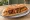 Bocadillo de All i Pebre: an illustration of garlic and paprika on baguette.