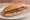 Bocadillo de Anchoas: an illustration of anchovy on baguette.