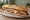 Bocadillo de Cachopo: an illustration of beef, ham and cheese on baguette.