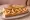 Bocadillo de Calamares a la Romana: an illustration of squid on baguette.