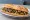 Bocadillo de Champiñones: an illustration of mushroom and garlic on baguette.