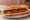Bocadillo de Chorizo a la Plancha: an illustration of pork, chorizo, paprika and garlic on baguette.