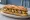 Bocadillo de Clòtxina: an illustration of olive oil, garlic, parsley and lemon on baguette.