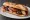Bocadillo de Compango: an illustration of pork, chorizo, morcilla and paprika on baguette.