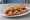 Bocadillo de Esgarraet: an illustration of cod, pepper, olive oil and garlic on baguette.