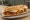 Bocadillo de Farinato: an illustration of pork and egg on baguette.