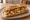 Bocadillo de Gambas al Ajillo: an illustration of shrimp, olive oil, garlic, pepper and more on baguette.