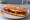 Bocadillo de Huevo Frito con Chorizo: an illustration of egg, chorizo, pork and olive oil on baguette.