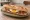 Bocadillo de Huevo Frito con Jamón: an illustration of egg, ham and olive oil on baguette.