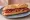 Bocadillo de Jamón: an illustration of jamón, tomato and olive oil on baguette.