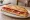 Bocadillo de Lomo: an illustration of pork, paprika and olive oil on baguette.