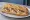 Bocadillo de Marinera: an illustration of anchovy, potato, carrot, tuna and more on baguette.