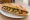 Bocadillo de Mejillones: an illustration of olive oil, garlic, parsley and lemon on baguette.