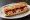 Bocadillo de Piquillo Relleno: an illustration of cod and olive oil on baguette.
