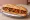 Bocadillo de Pisto: an illustration of tomato, pepper, onion and olive oil on baguette.