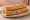 Bocadillo de Pollo: an illustration of chicken and olive oil on baguette.