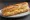 Bocadillo de Queso Manchego Curado: an illustration of manchego on baguette.