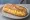 Bocadillo de Revuelto: an illustration of egg and olive oil on baguette.