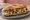 Bocadillo de Revuelto de Setas: an illustration of egg, mushroom, garlic and olive oil on baguette.