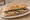 Bocadillo de Sardinas: an illustration of sardine and olive oil on baguette.