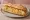 Bocadillo de Tortilla con Cebolla: an illustration of egg, potato, onion and olive oil on baguette.