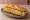 Bocadillo de Tortilla sin Cebolla: an illustration of egg, potato and olive oil on baguette.