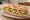 Bocadillo de Zarangollo: an illustration of egg, onion and olive oil on baguette.