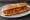 Bocadillo de Zorza: an illustration of pork, paprika, garlic and olive oil on baguette.