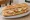 Bocadillo Vegetal con Atún: an illustration of tuna, egg, lettuce, tomato and more on baguette.