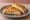 Bougatsa me Tyri: an illustration of feta and butter.