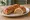 Brabantse Worstenbroodjes: an illustration of pork, sausage and pepper.