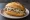 Brathering Brötchen: an illustration of herring, onion and vinegar on kaiser roll.