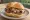 Bratwurst: an illustration of pork, sauerkraut, mustard and onion.