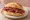 Bresaola con Limone: an illustration of lemon, olive oil and pepper on bread.