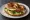 Brezel mit Butter und Schnittlauch: an illustration of butter and scallion.