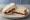 Brie and Cranberry: an illustration of brie, cranberry sauce and butter on white bread.