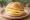 Broodje Belegen Kaas: an illustration of gouda and butter on kaiser roll.