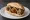 Broodje Bitterballen: an illustration of beef and mustard on kaiser roll.