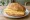 Broodje Boerenkaas: an illustration of gouda and butter on kaiser roll.