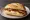 Broodje Ei met Spek: an illustration of egg, pork belly and butter on kaiser roll.