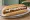 Broodje Frikandel: an illustration of pork, beef, chicken, sausage and more on kaiser roll.