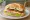 Broodje Gezond: an illustration of ham, egg, gouda, lettuce and more on kaiser roll.