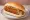Broodje Groentekroket: an illustration of potato and mustard on kaiser roll.