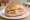 Broodje Ham: an illustration of ham and butter on kaiser roll.