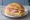 Broodje Ham-Kaas: an illustration of ham, gouda, butter and mustard on kaiser roll.
