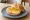 Broodje Honing: an illustration of honey and butter on kaiser roll.