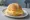 Broodje Jonge Kaas: an illustration of gouda and butter on kaiser roll.